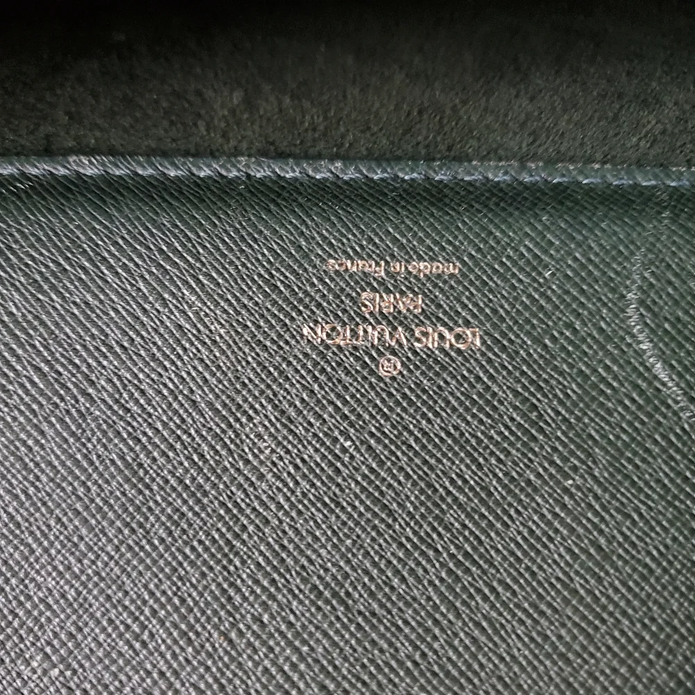 Fantastic Louis Vuitton dark green taiga leather briefcase